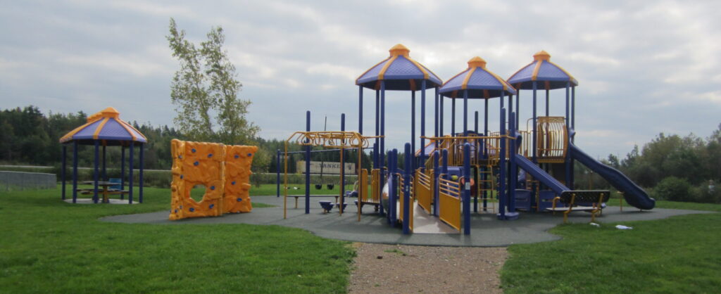 A bright purple and golden yellow playground.