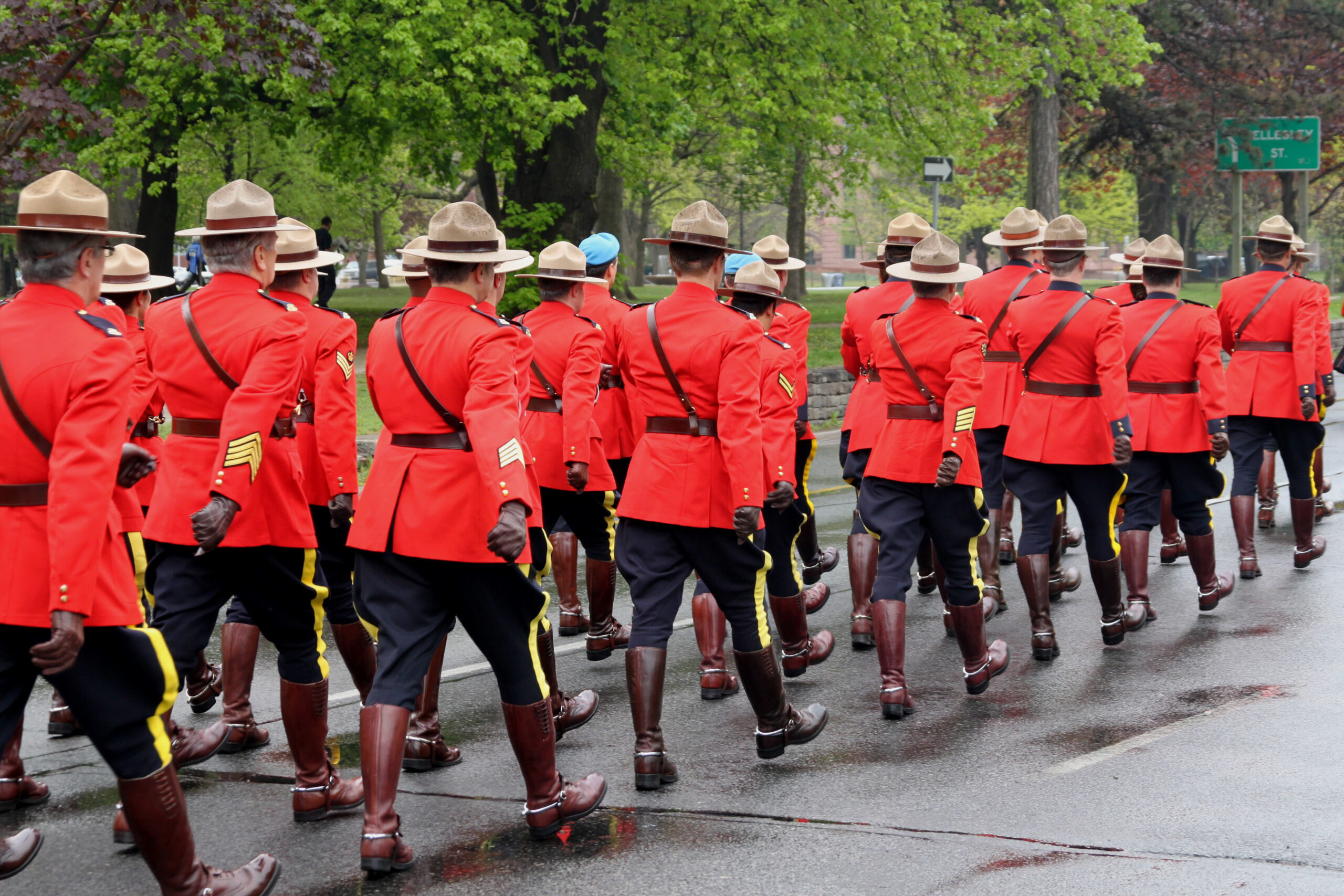 RCMP marching wearing red serge